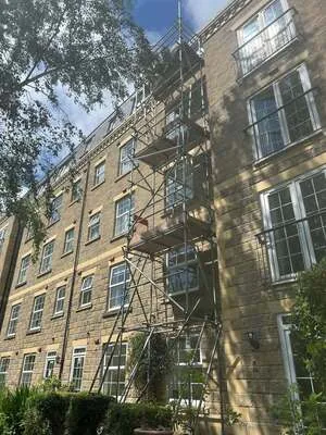 Scaffolding on a multi-storey stone apartment building