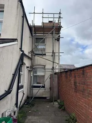 Chimney scaffold on the rear of a narrow terraced house